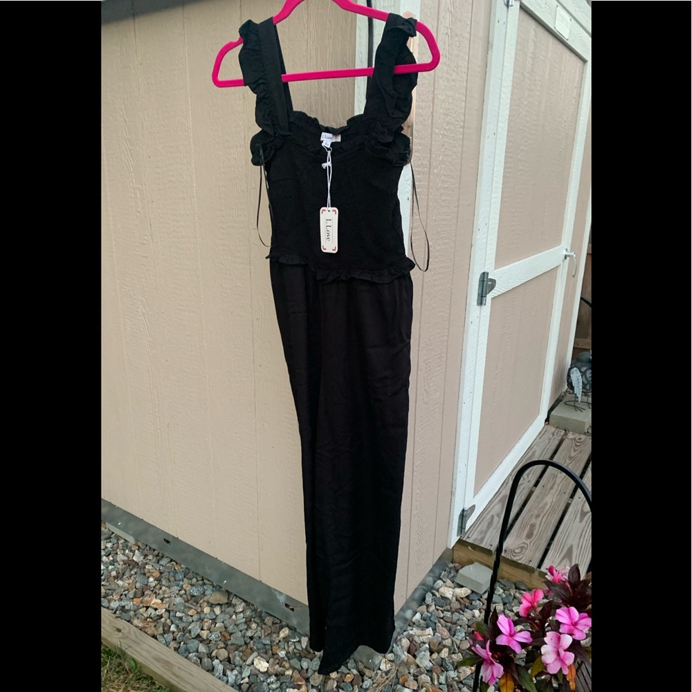 Nwt black smocked jumpsuit size large